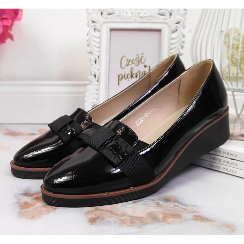 Women's lace-up wedge shoes with a black bow Vinceza